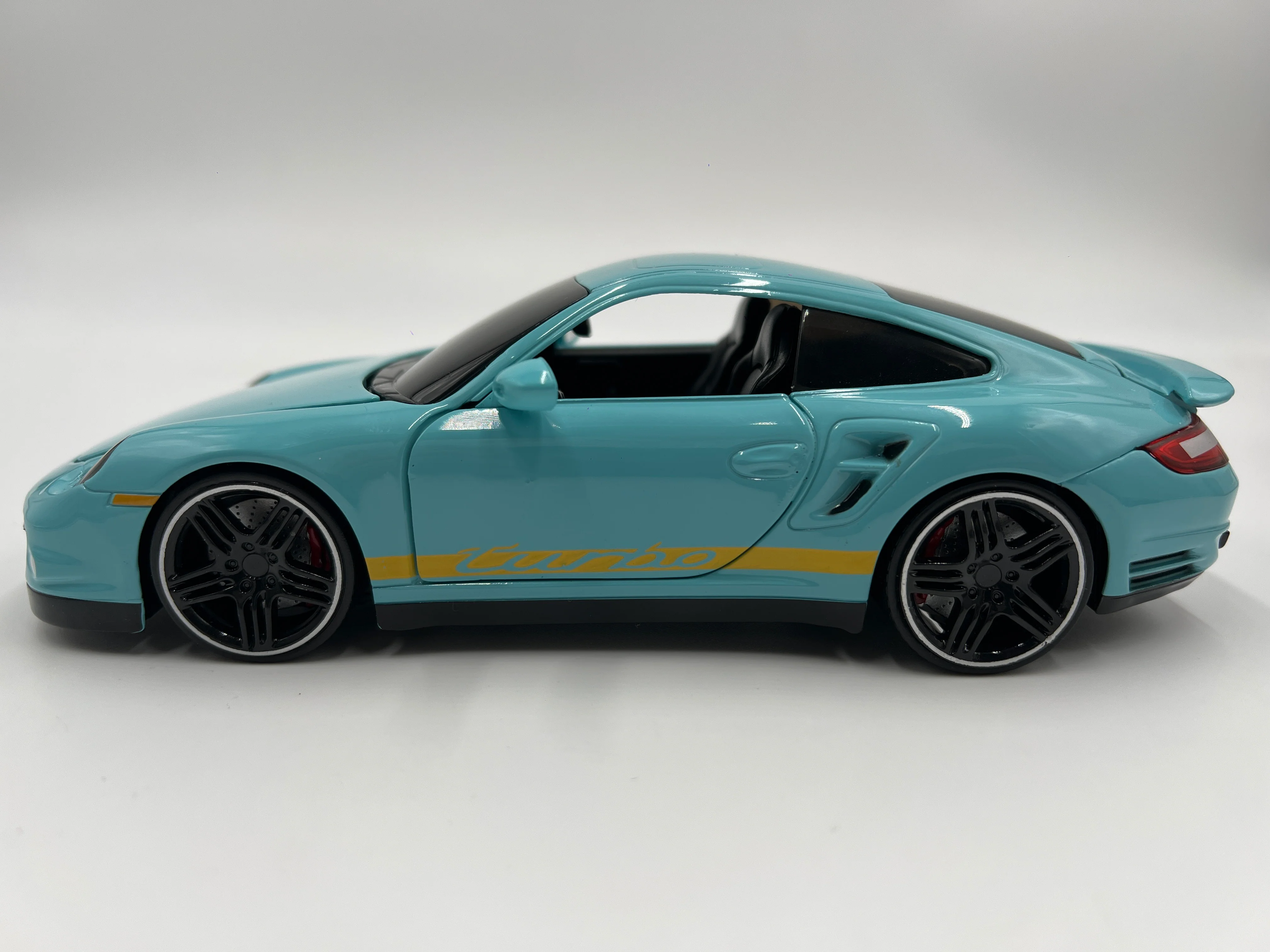 Jada Toys 1/24 Scale Pink Slips 2007 Porsche 911 Turbo Light Blue Loose - Image 5