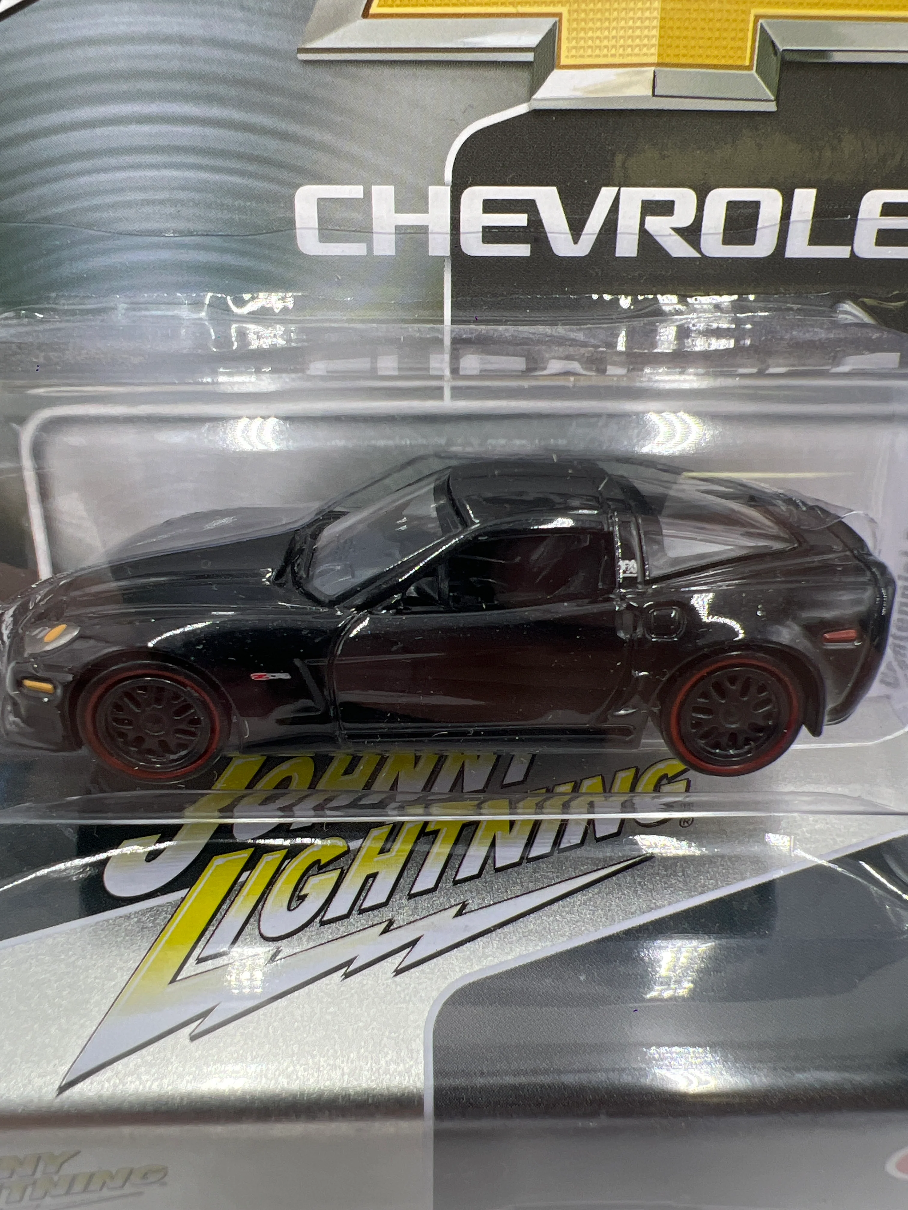 Johnny Lightning 2012 Chevy Corvette Z06 Centennial Edition Black W/Tin 217D - Image 3