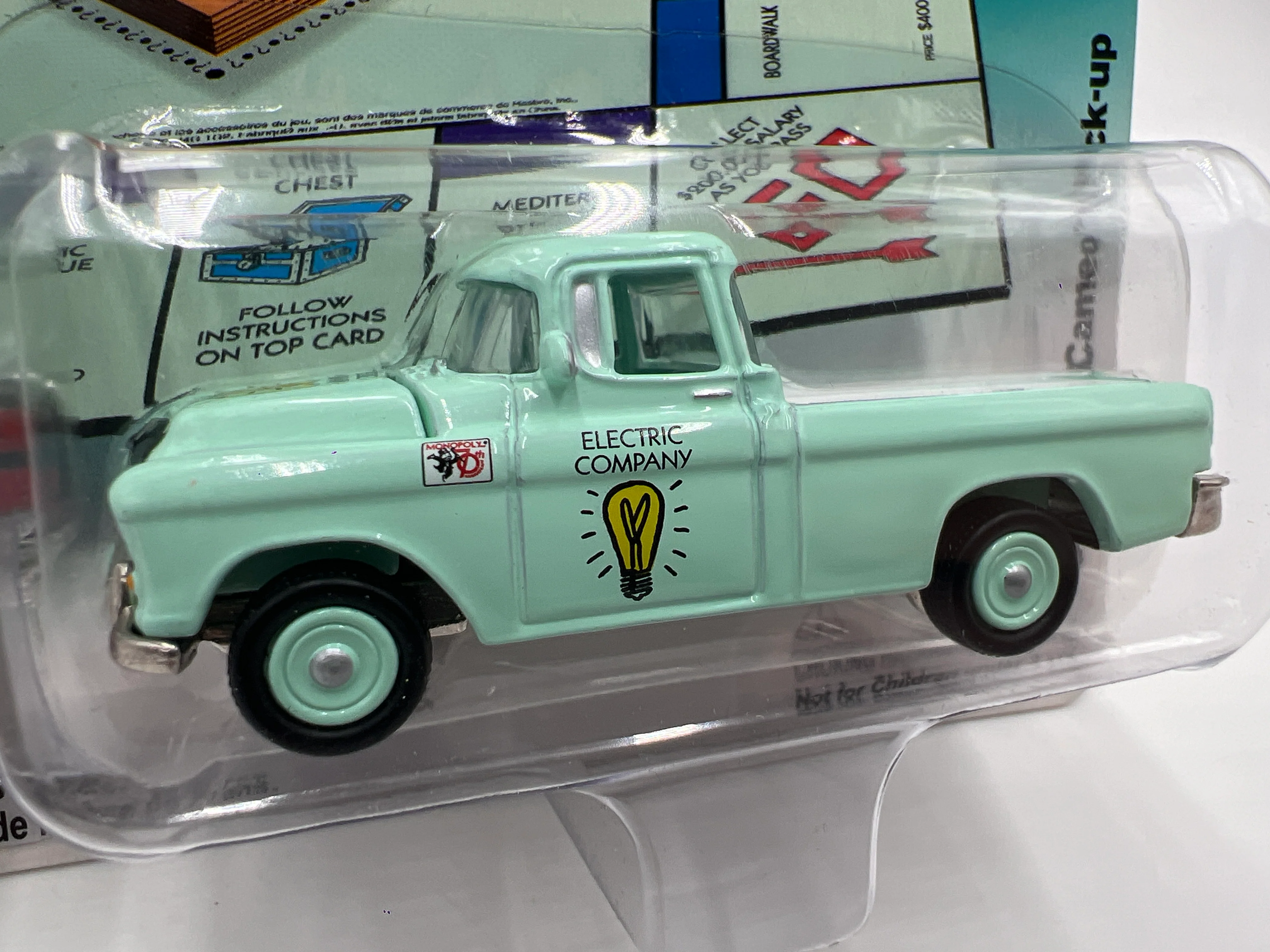 Johnny Lightning Monopoly 70th Anniversary 1955 Chevy Cameo Light Green 230D - Image 3