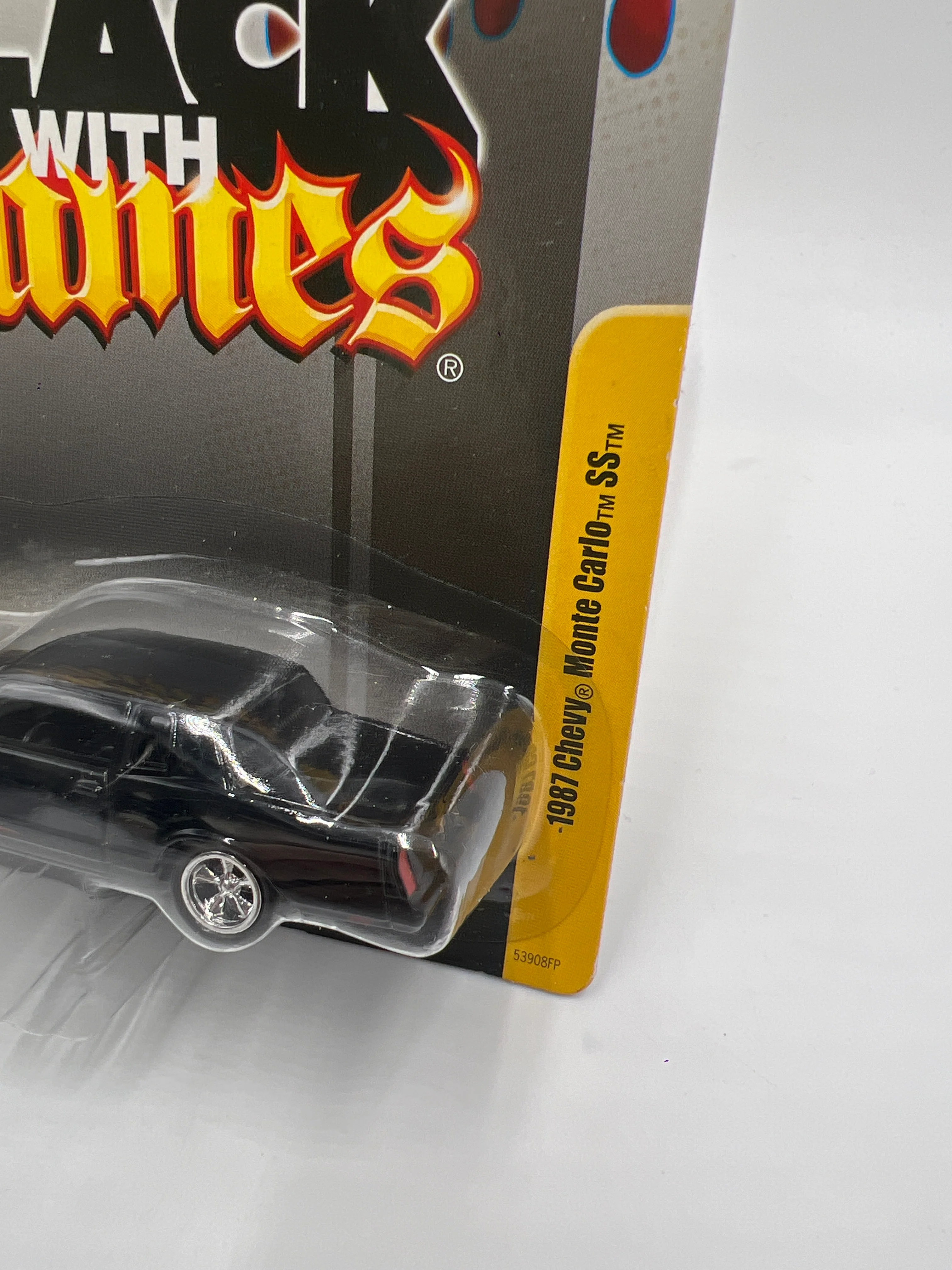 Johnny Lightning Small Card Black With Flames 1987 Chevy Monte Carlo SS W/Protector - Image 3