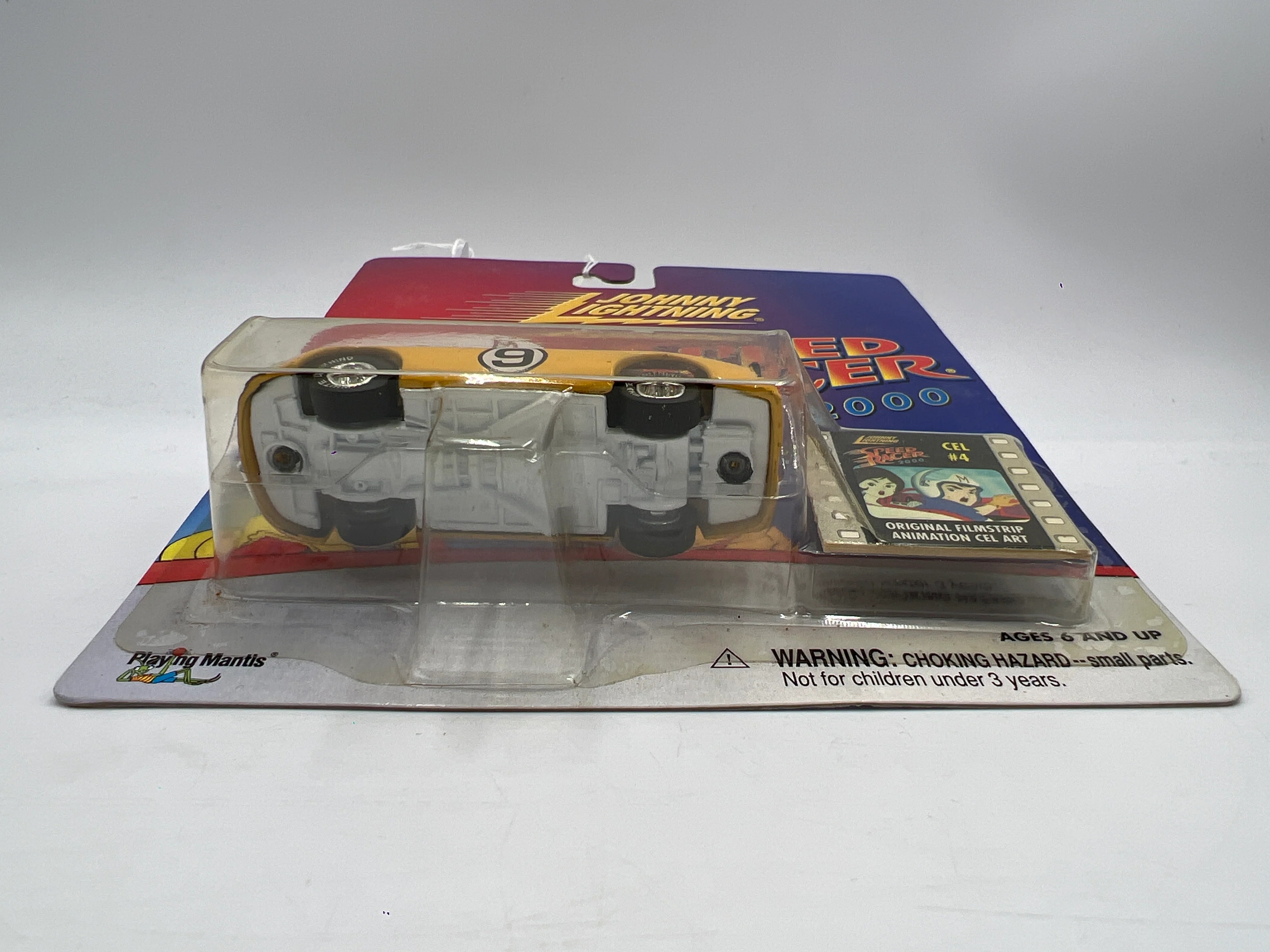 Johnny Lightning White Lightning Chase Speed Racer 2000 CEL #4 Racer X Stock Car Yellow - Image 6