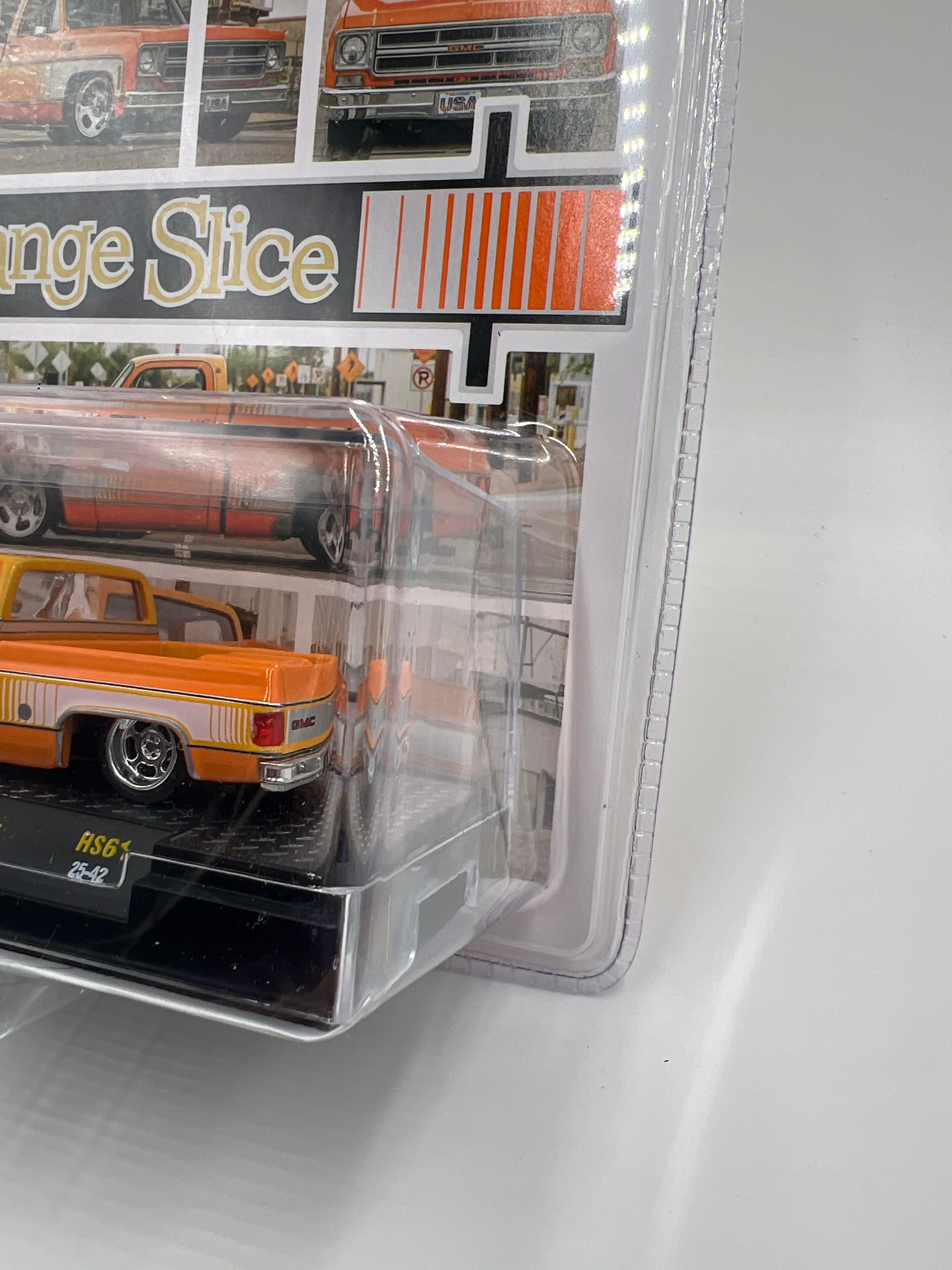 M2 Machines Hobby Exclusive Orange Slice 1976 GMC Sierra Grande 15 HS61 201D - Image 3