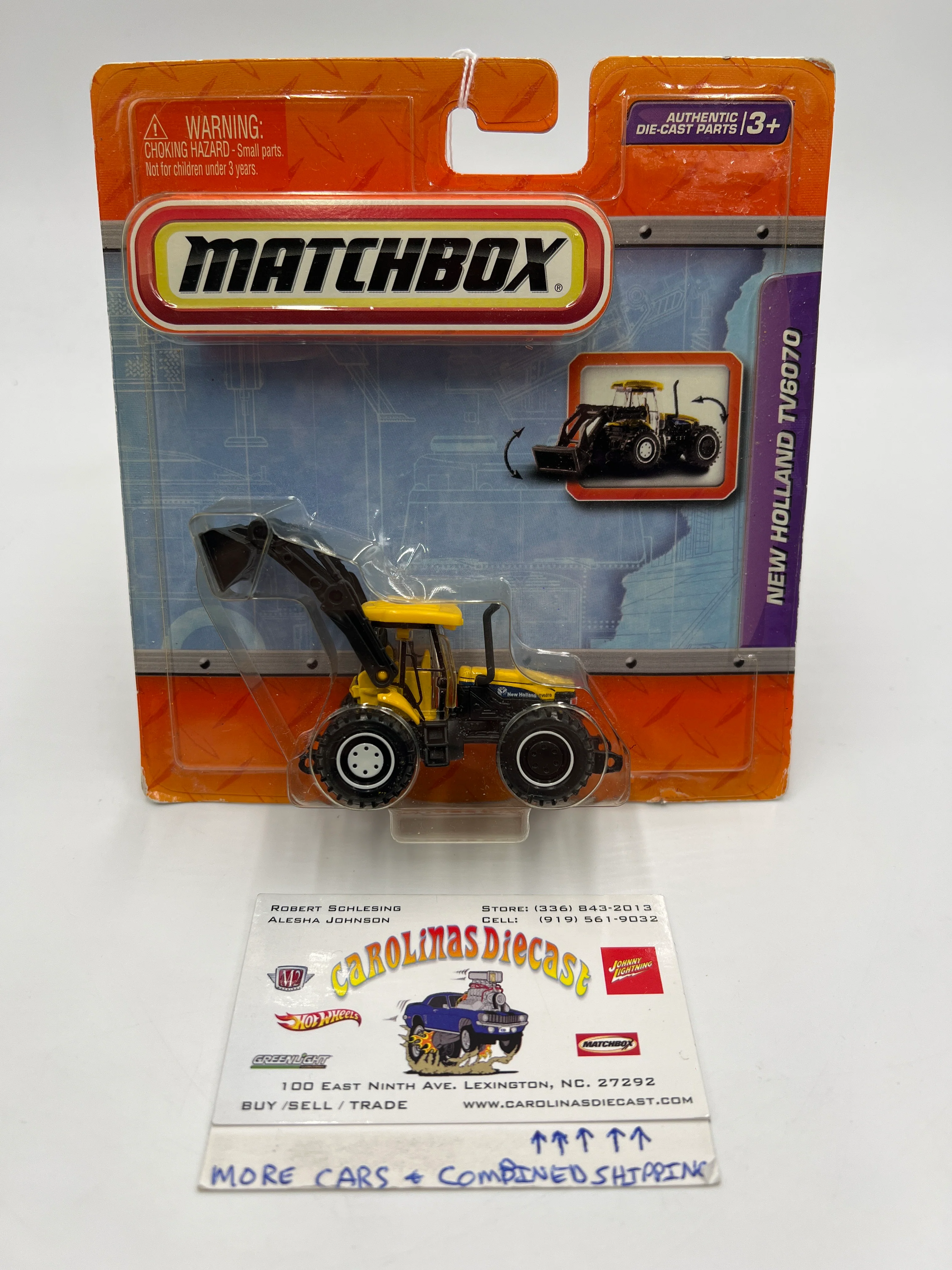 2010 Matchbox Real Working Rigs New Holland TV6070 Yellow (Bad Card/Cracked Blister)