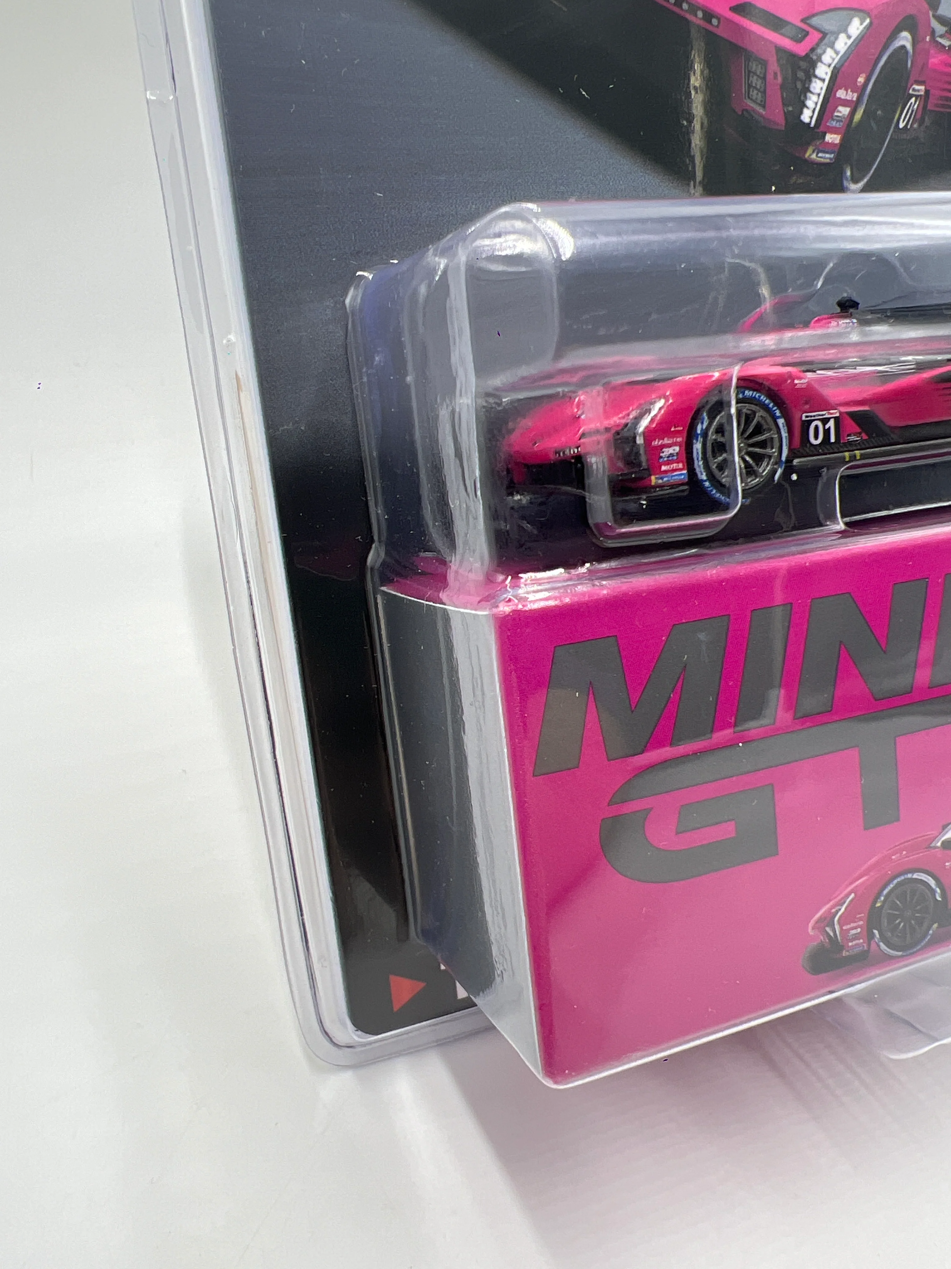 Mini GT #1010 Cadillac V-Series.R #01 2024 IMSA Petit Le Mans Cadillac Racing Pink/Black - Image 4