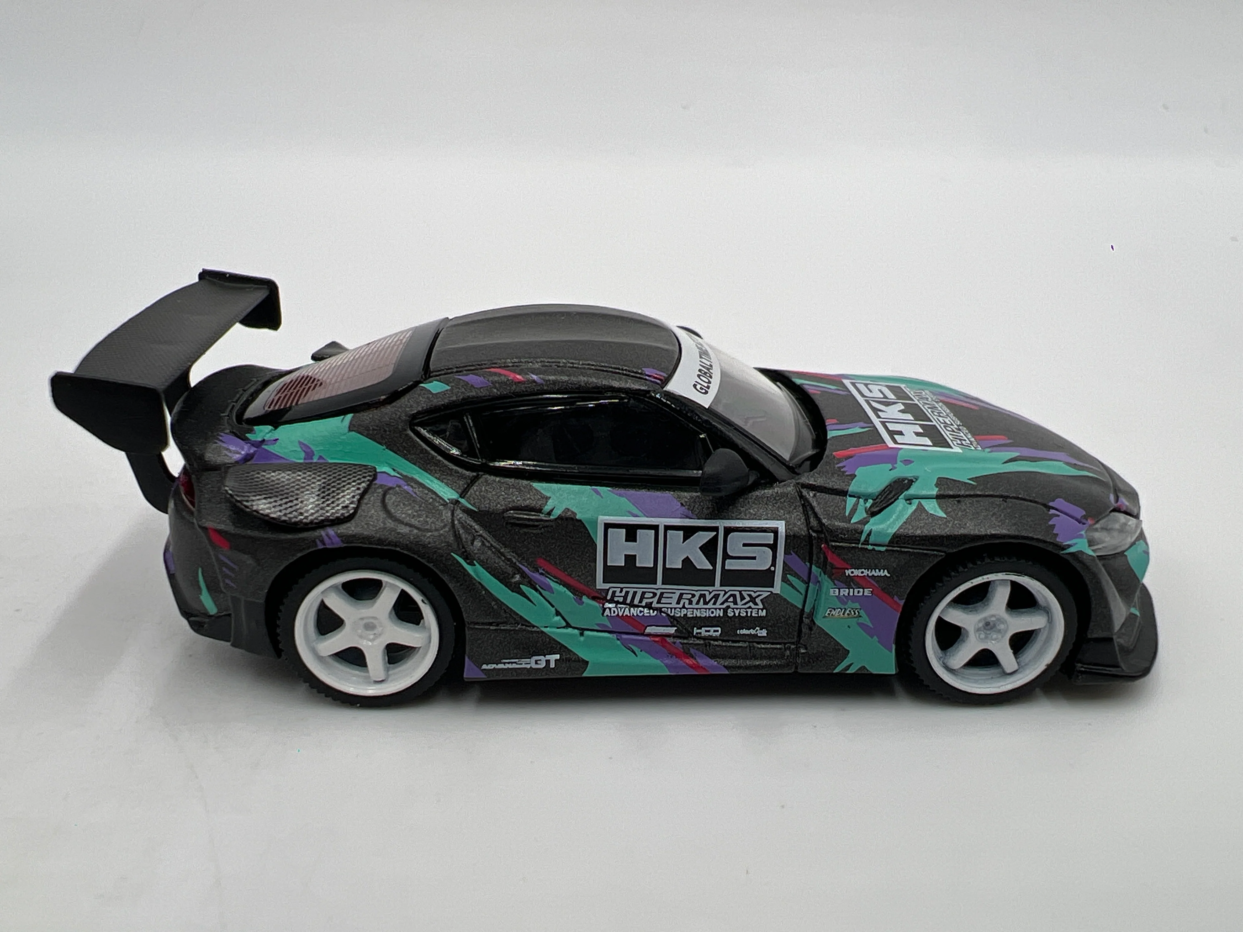 Mini GT #212 MiJo Exclusive HKS Toyota GR Supra 2019 SEMA Presentation - Image 5
