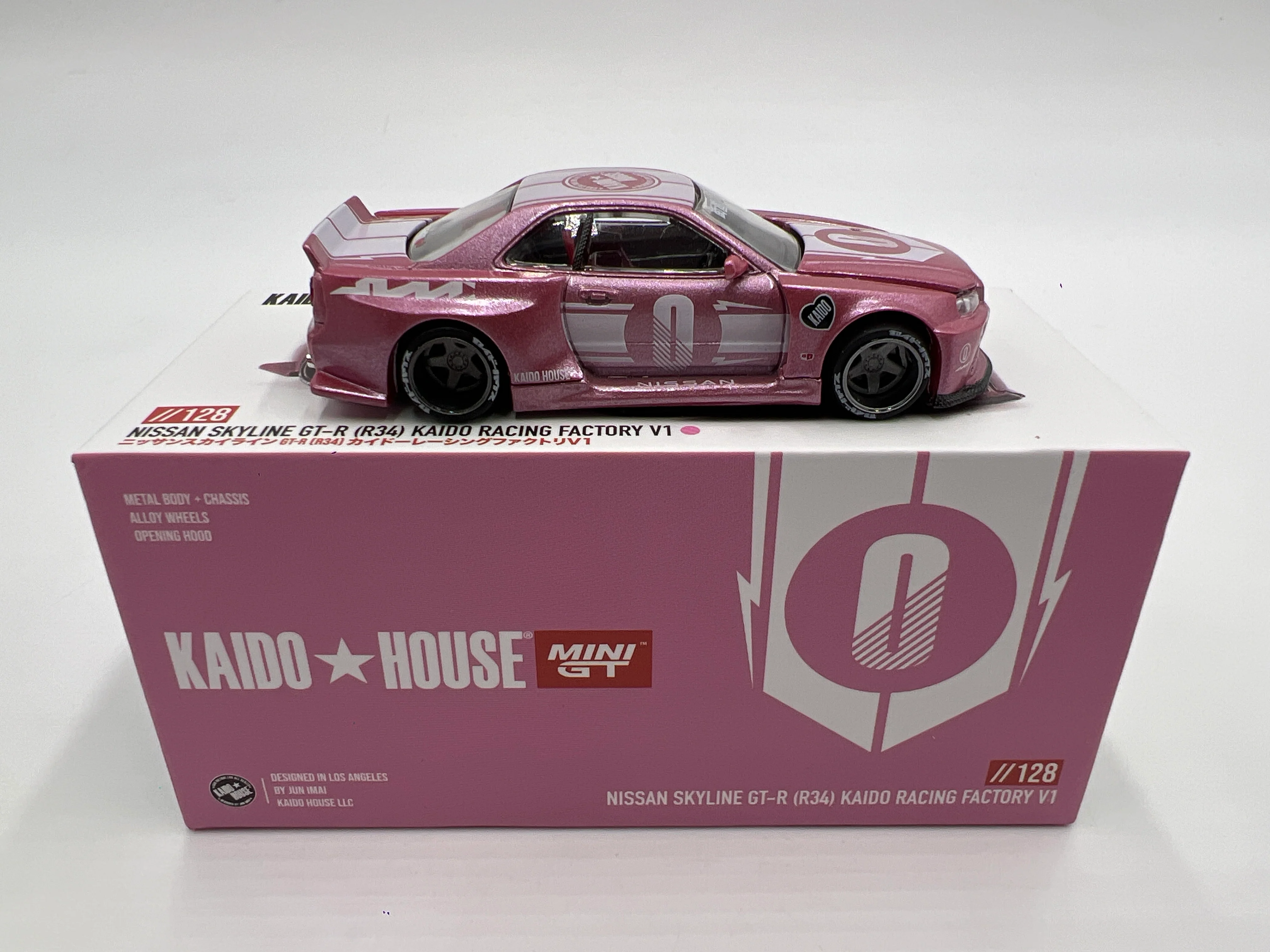 Mini GT Kaido House #128 Nissan Skyline GT-R R34 Kaido Racing Factory V1 Pink