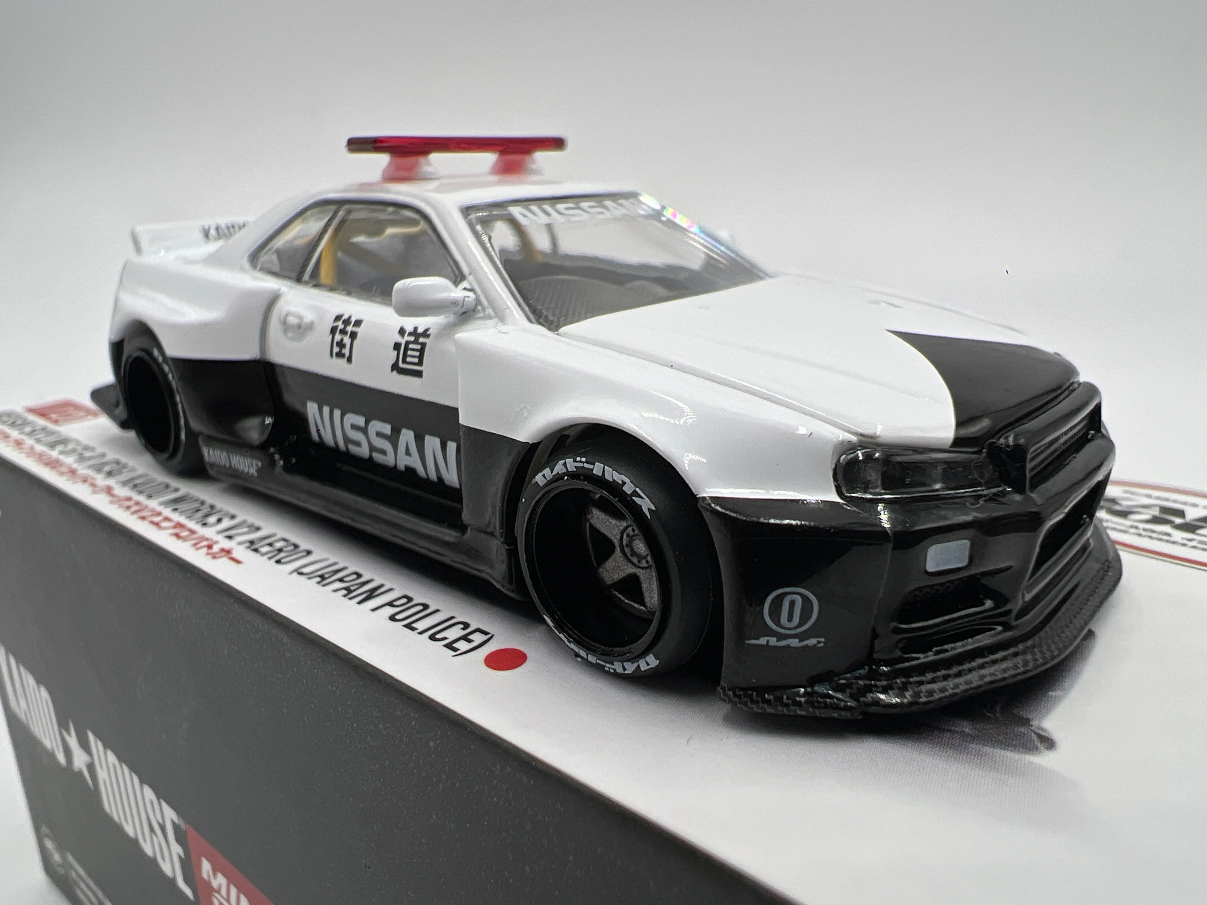 Mini GT x Kaido House #120 Nissan Skyline GT-R R34 Kaido Works V2 Aero Japan Police - Image 3
