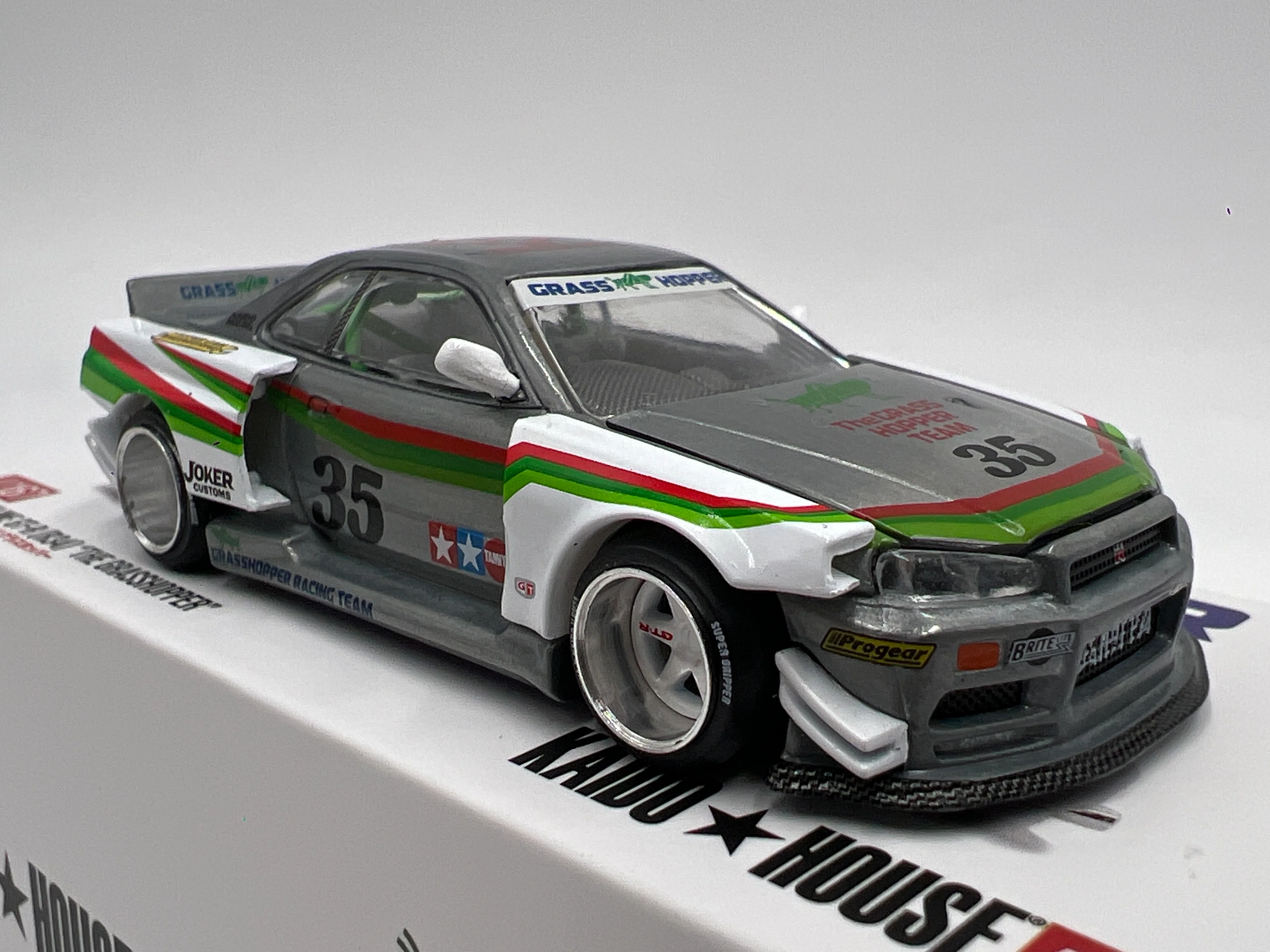 Mini GT Kaido House x Tamiya Collab #167 CHASE Nissan Skyline GT-R R34 The Grasshopper - Image 2