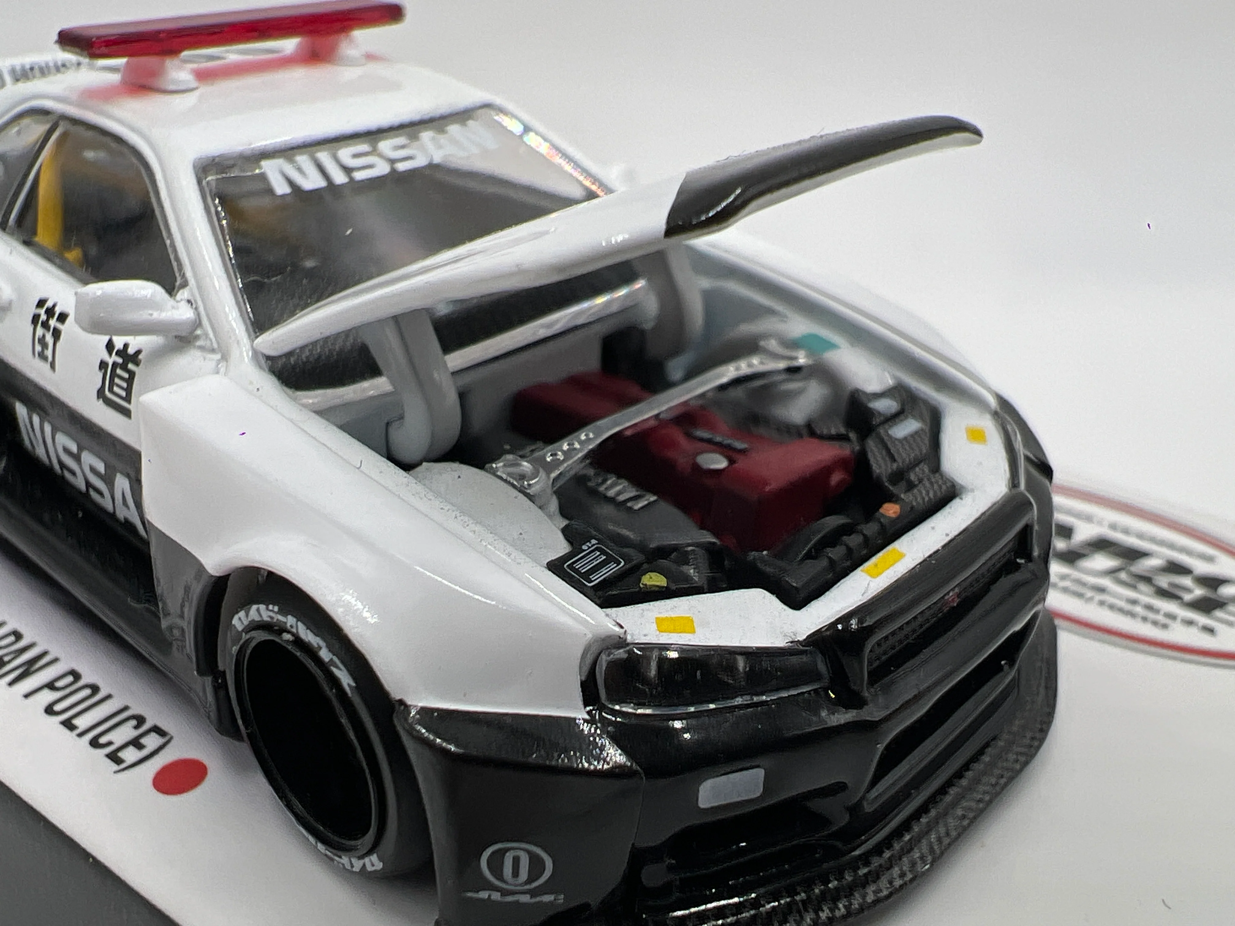 Mini GT x Kaido House #120 Nissan Skyline GT-R R34 Kaido Works V2 Aero Japan Police - Image 4