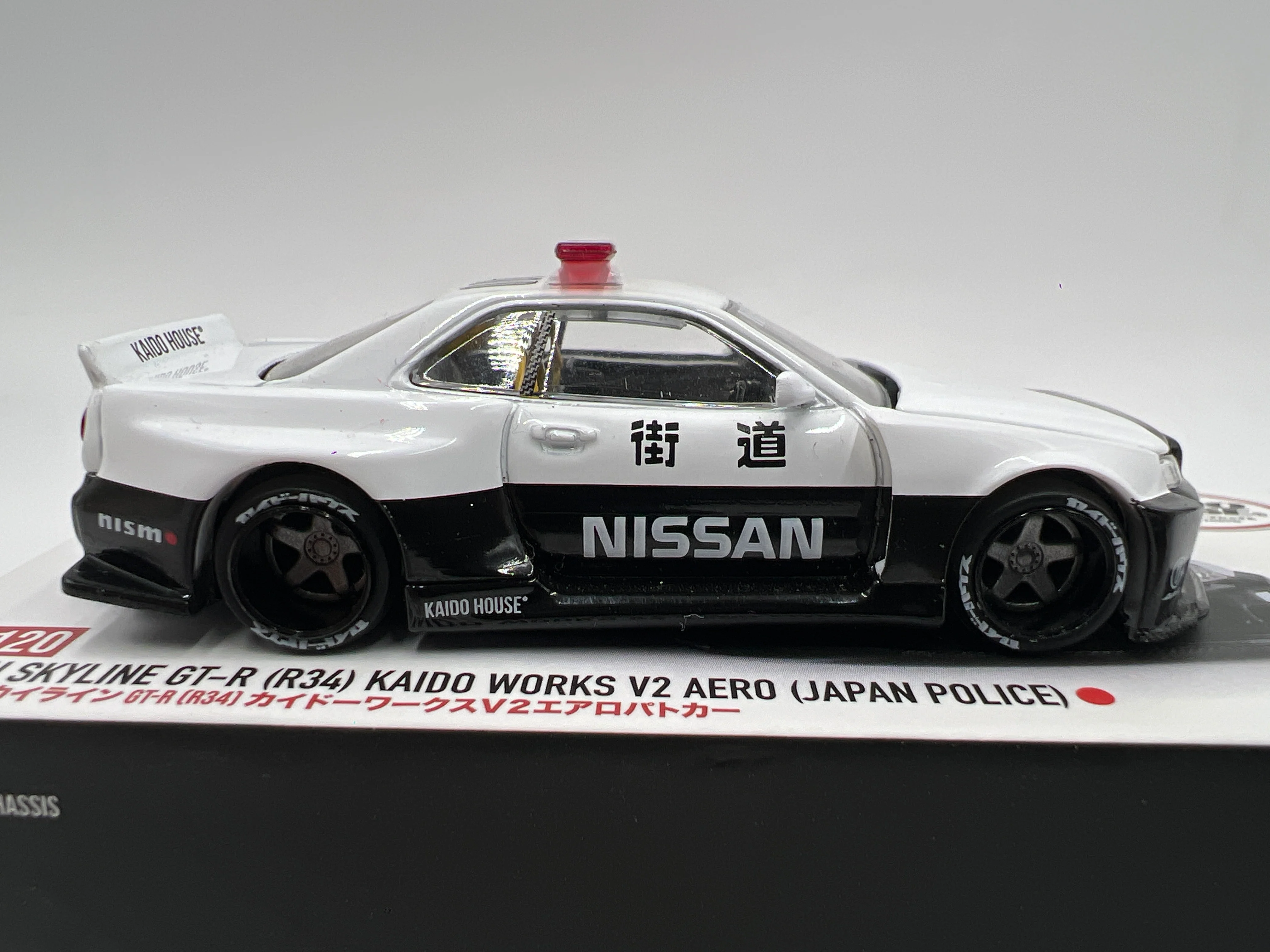 Mini GT x Kaido House #120 Nissan Skyline GT-R R34 Kaido Works V2 Aero Japan Police - Image 5