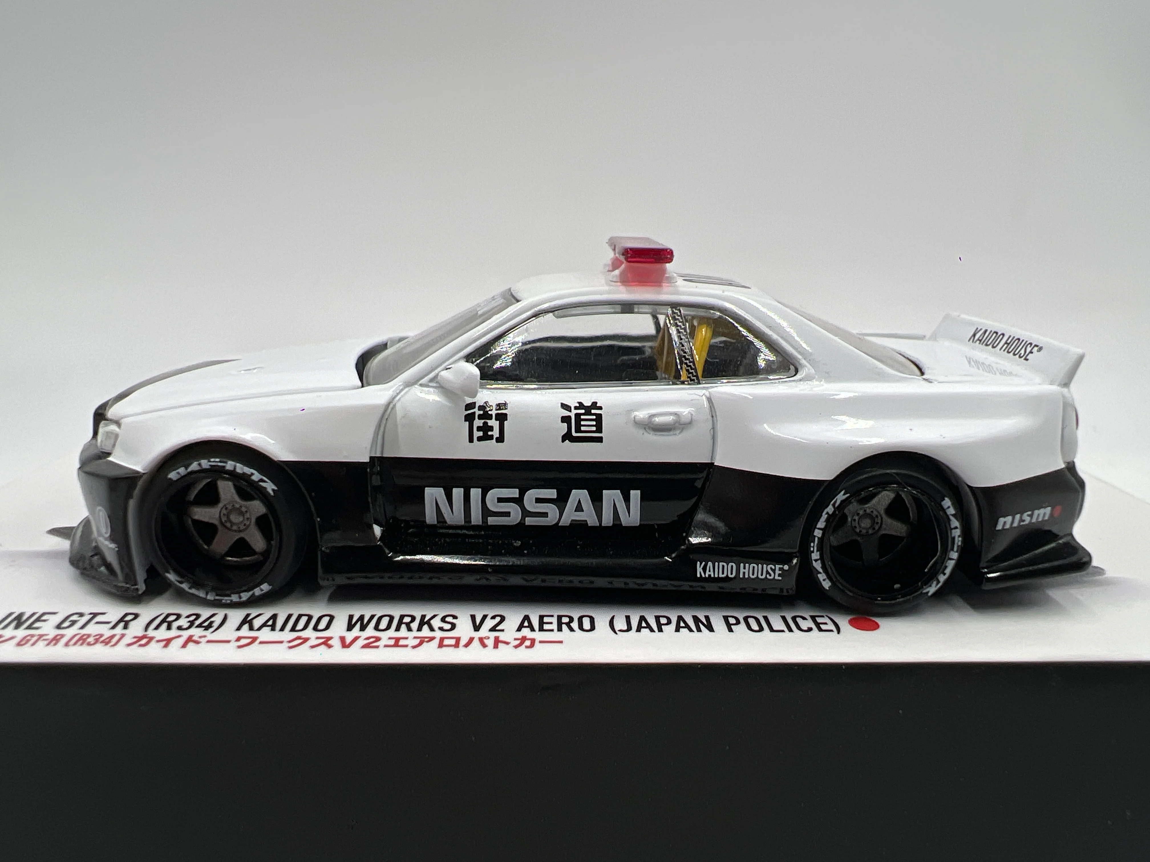 Mini GT x Kaido House #120 Nissan Skyline GT-R R34 Kaido Works V2 Aero Japan Police - Image 6