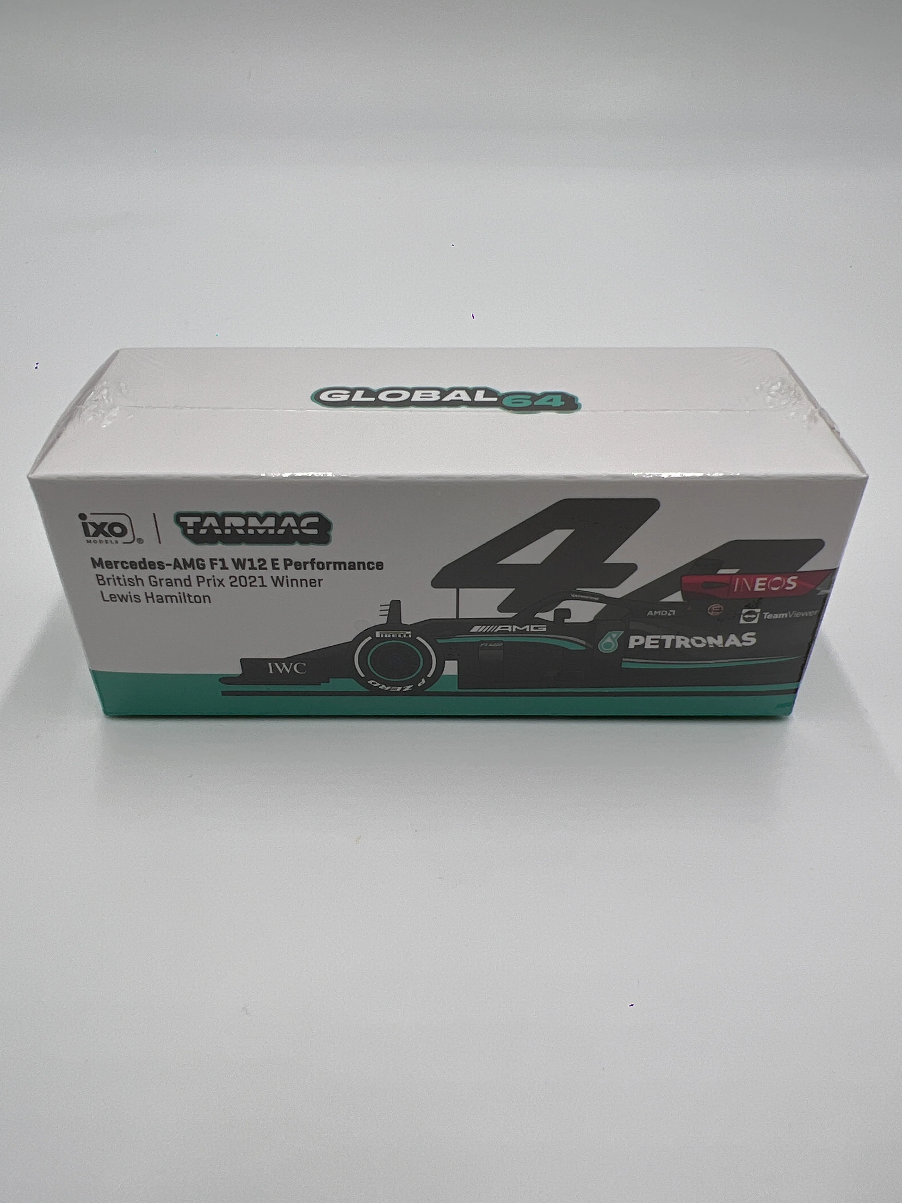 Tarmac Works Global64 IXO Models Lewis Hamilton Mercedes-AMG F1 W12 E Performance British Grand Prix 2021 Winner Sealed - Image 2