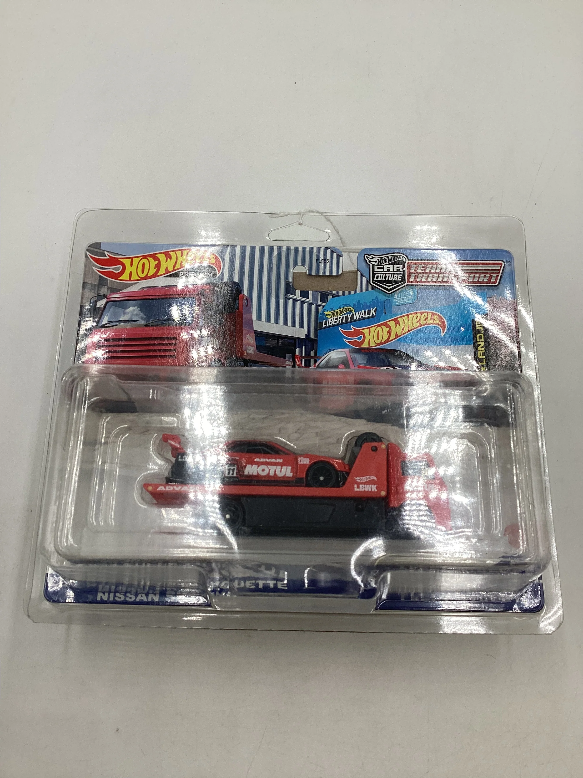 HOT WHEELS 2023 TEAM TRANSPORT #44 LB-ER34 Super Silhouette Nissan Skyline & Fleet Street with protector - Image 9