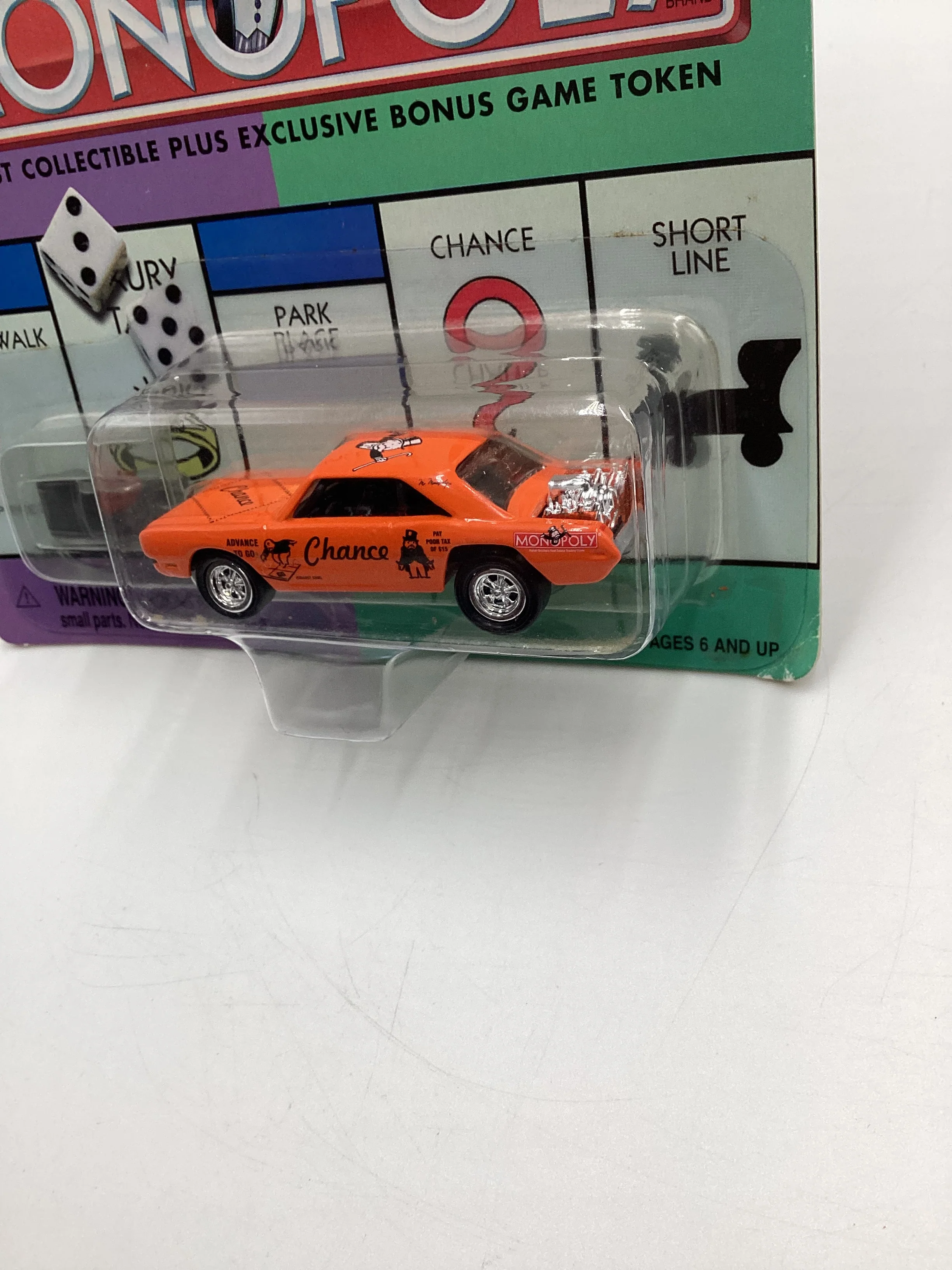 Johnny Lightning Monopoly Chance W/Token 1970 Dodge Dart Orange - Image 4