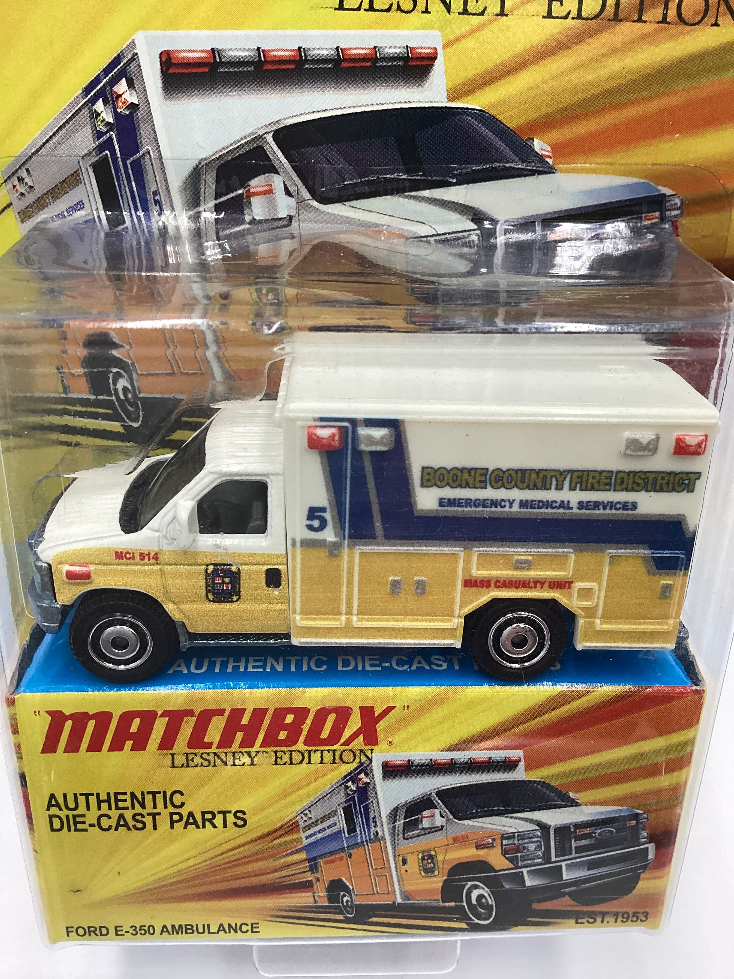 2011 Matchbox Lesley Edition Boone County Ford E-350 Ambulance Yellow - Image 3