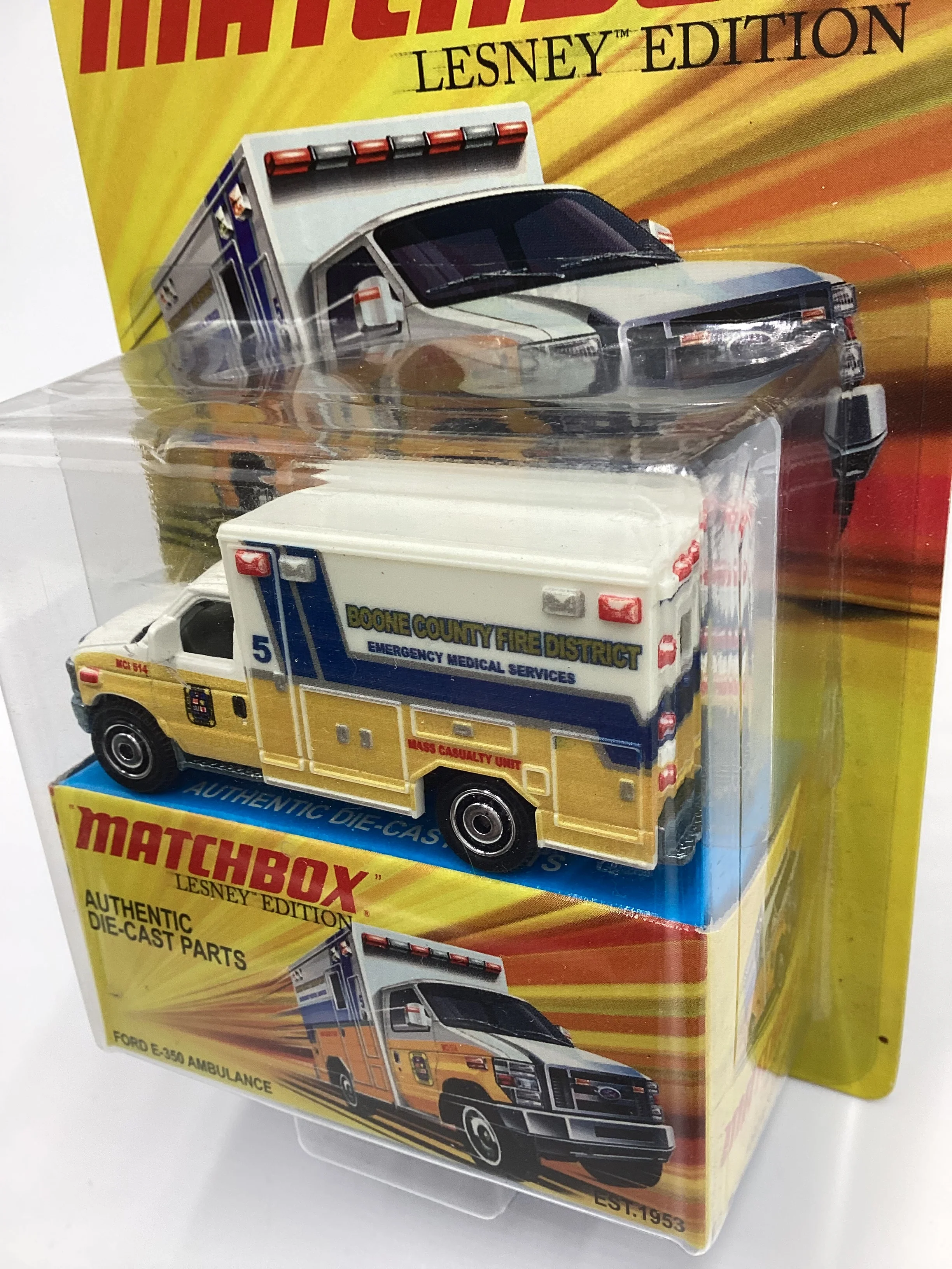 2011 Matchbox Lesley Edition Boone County Ford E-350 Ambulance Yellow - Image 4