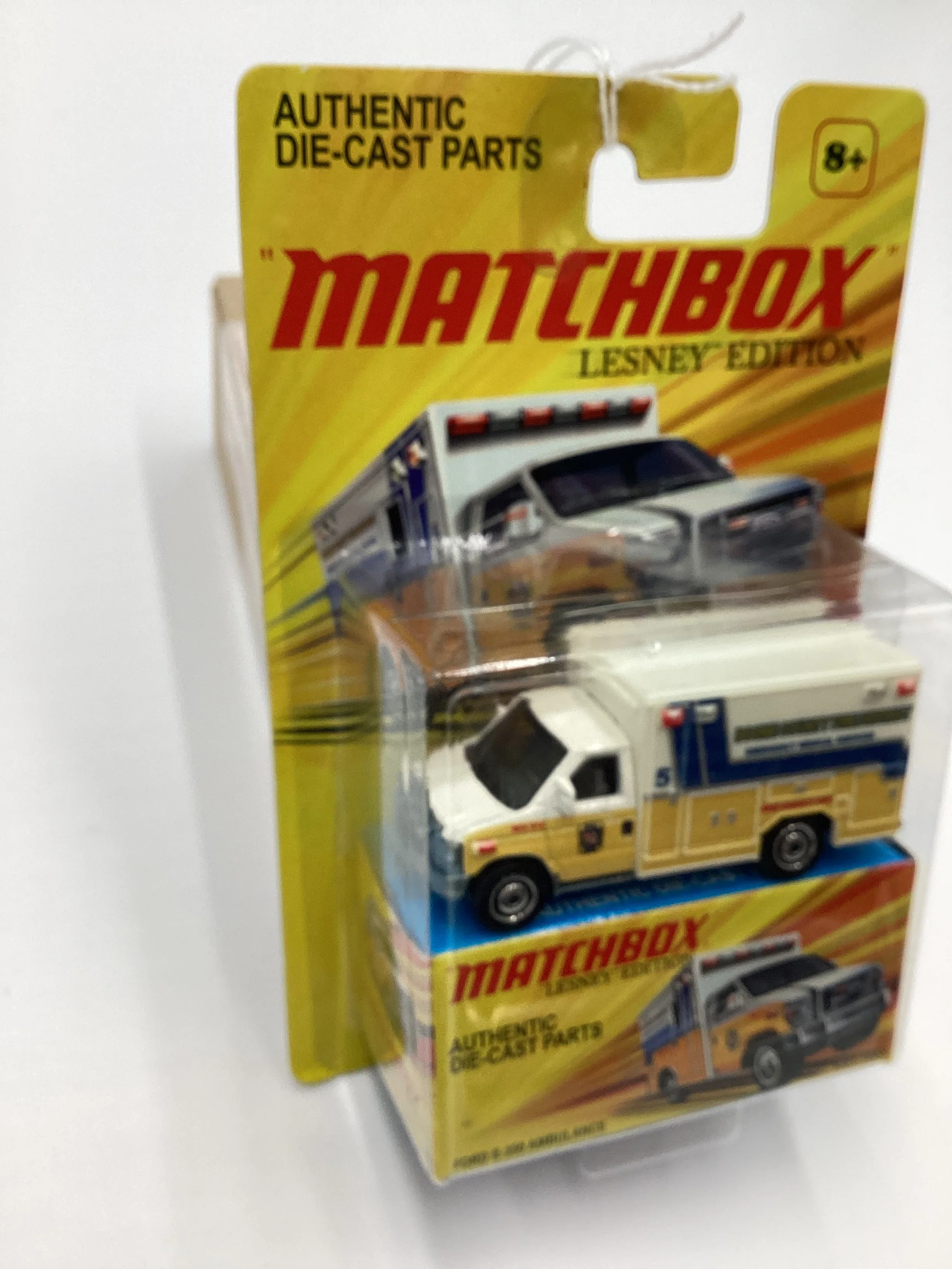 2011 Matchbox Lesley Edition Boone County Ford E-350 Ambulance Yellow - Image 5