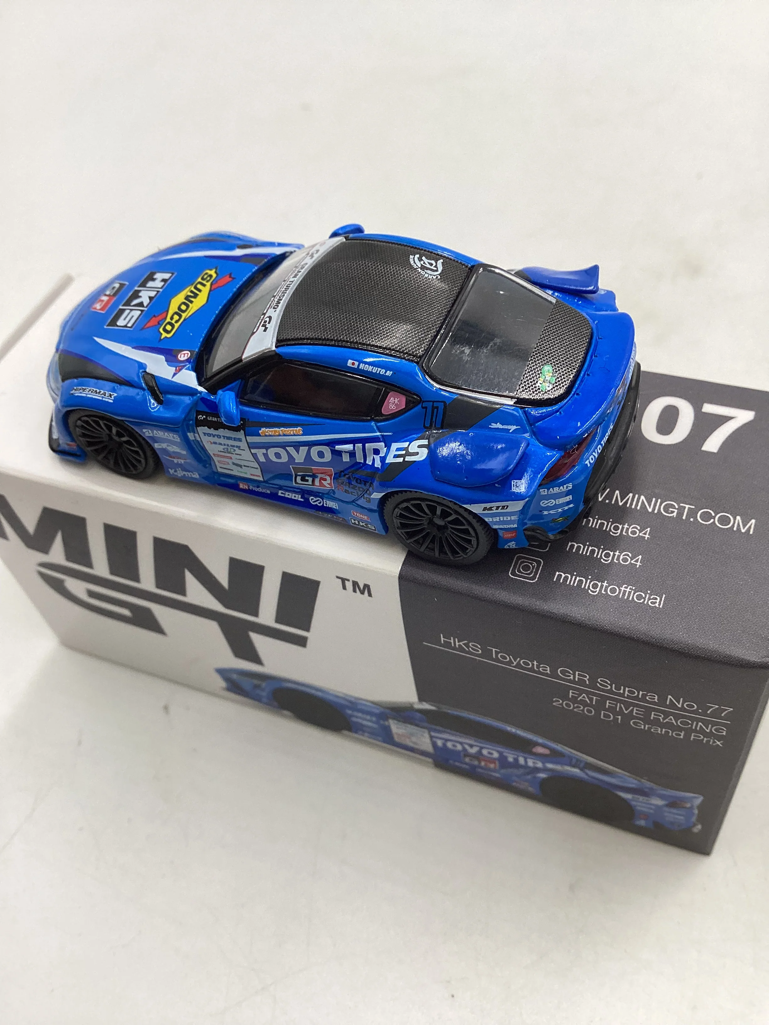 Mini GT #307 Opened HKS Toyota GR Supra No. 77 Blue - Image 3