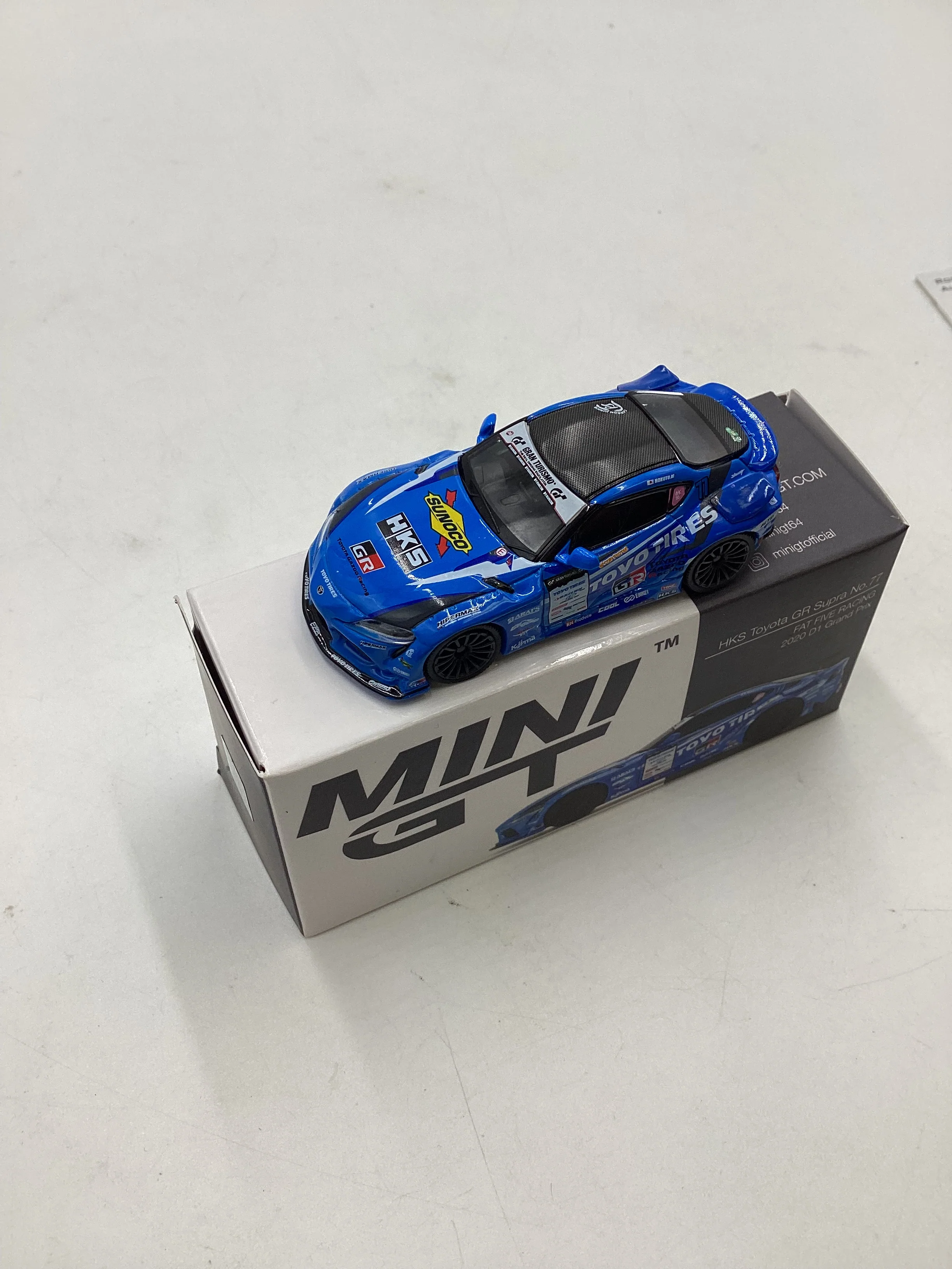 Mini GT #307 Opened HKS Toyota GR Supra No. 77 Blue - Image 4